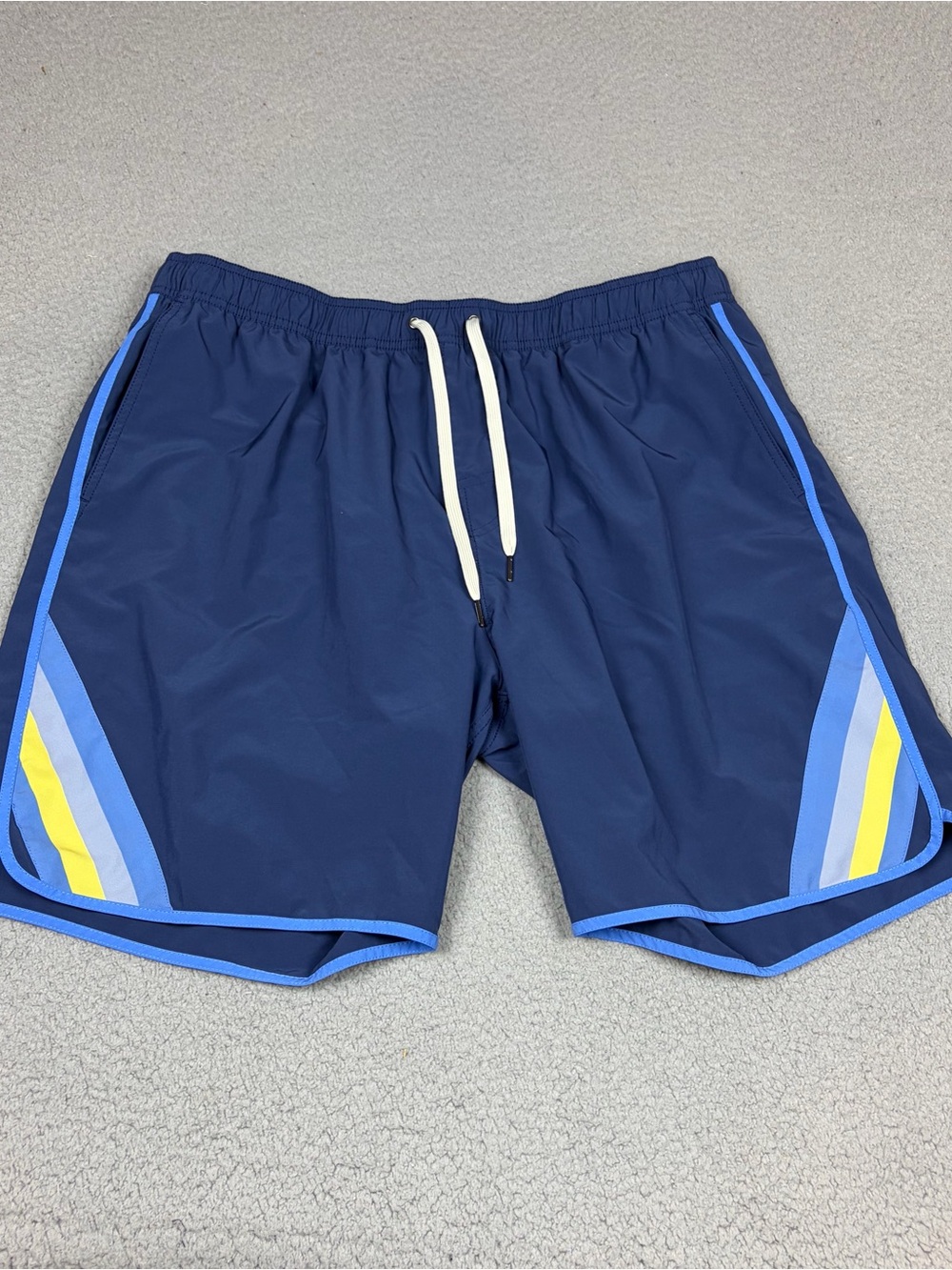 Fair Harbor Navy Swim Trunks with Light Blue and Yellow Side Stripes Lined Beach